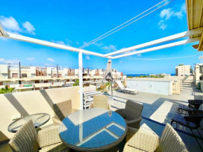 Playa Elisa Mil Palmeras by Villas&You